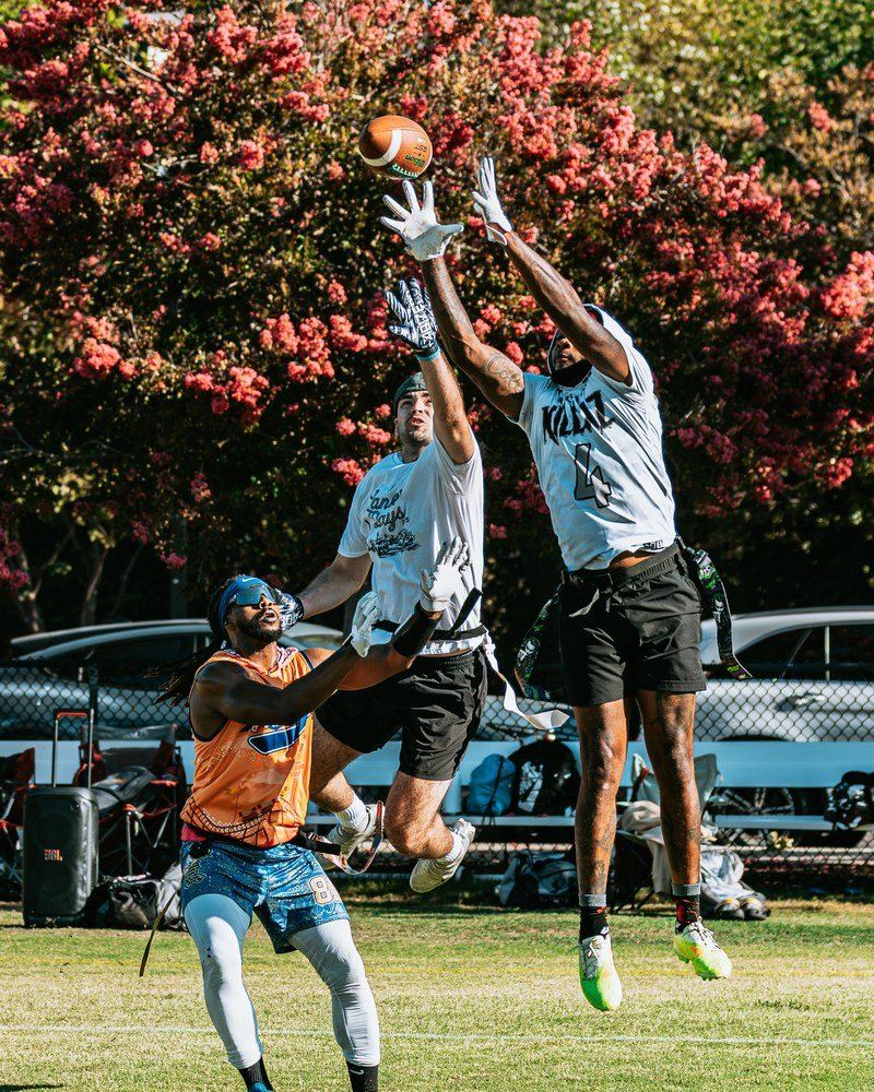 Team wearing a custom KitBeast flag football jersey on the field