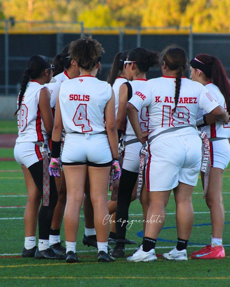 Team wearing a custom KitBeast flag football jersey on the field