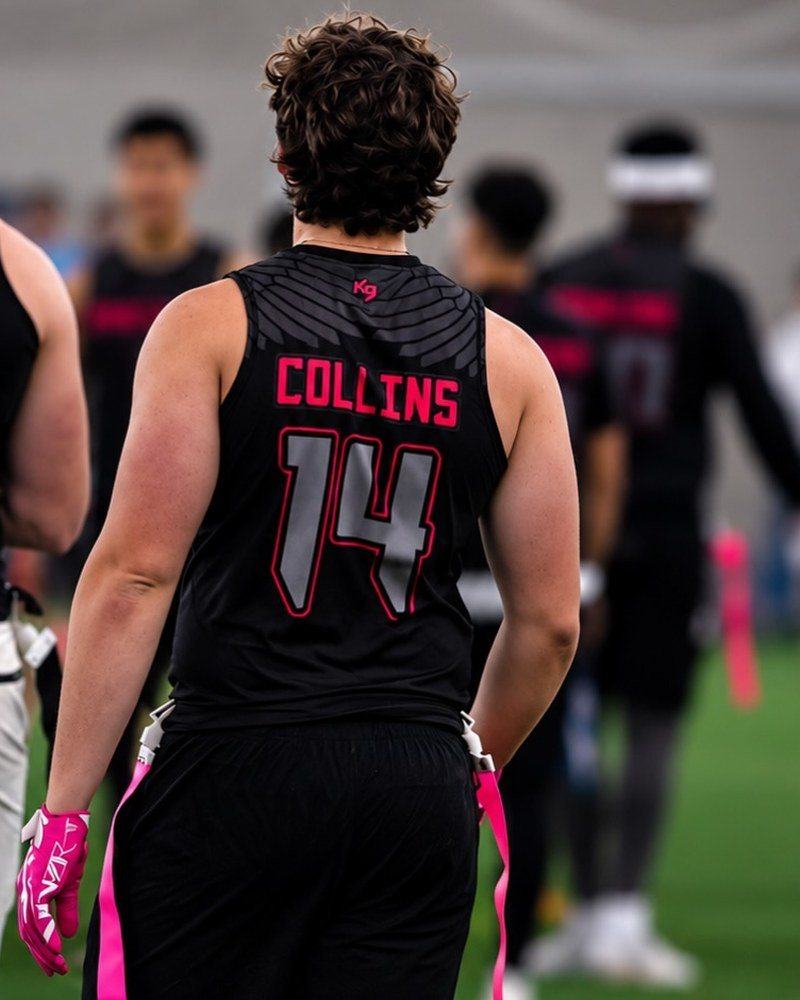 Team wearing a custom KitBeast flag football jersey on the field